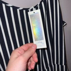 Black and white striped romper new with tag size medium ci sono 9.2oz 95% polyes