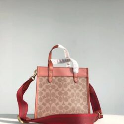 Field Tote 22 In Signature Canvas With Horse And Carriage Print
