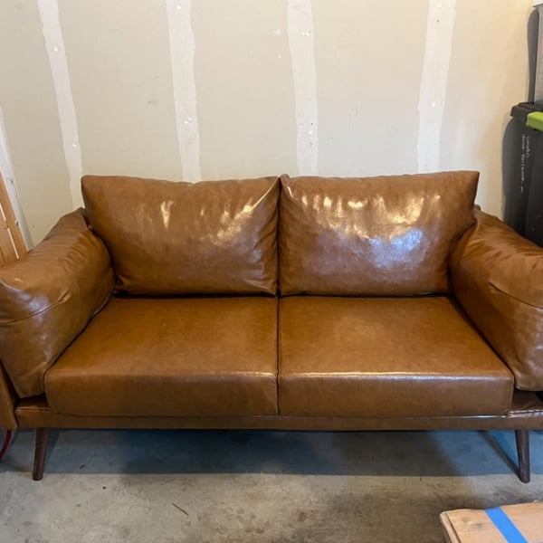 Tan faux leather couch