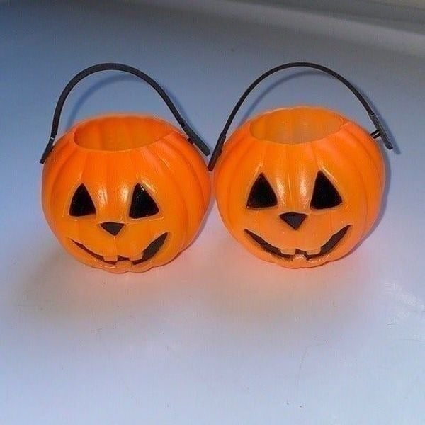 2 small Halloween Jack O Lante