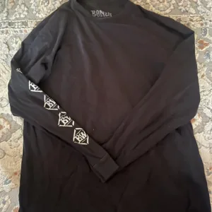 Bones Men's Black and Brown Shirt