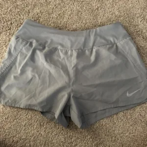 Nike Women's Grey and Blue Shorts
